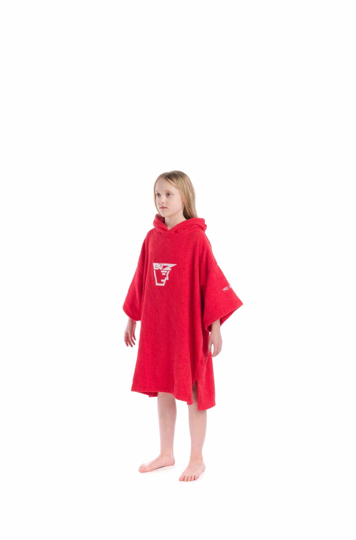 Child wearing a red hooded Buz poncho on a white background