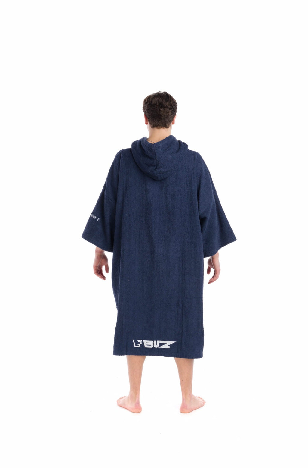 Person wearing a navy blue hooded towel with a brand logo on a white background