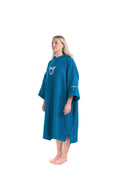 Person wearing a blue changing poncho with a Buz logo on a white background