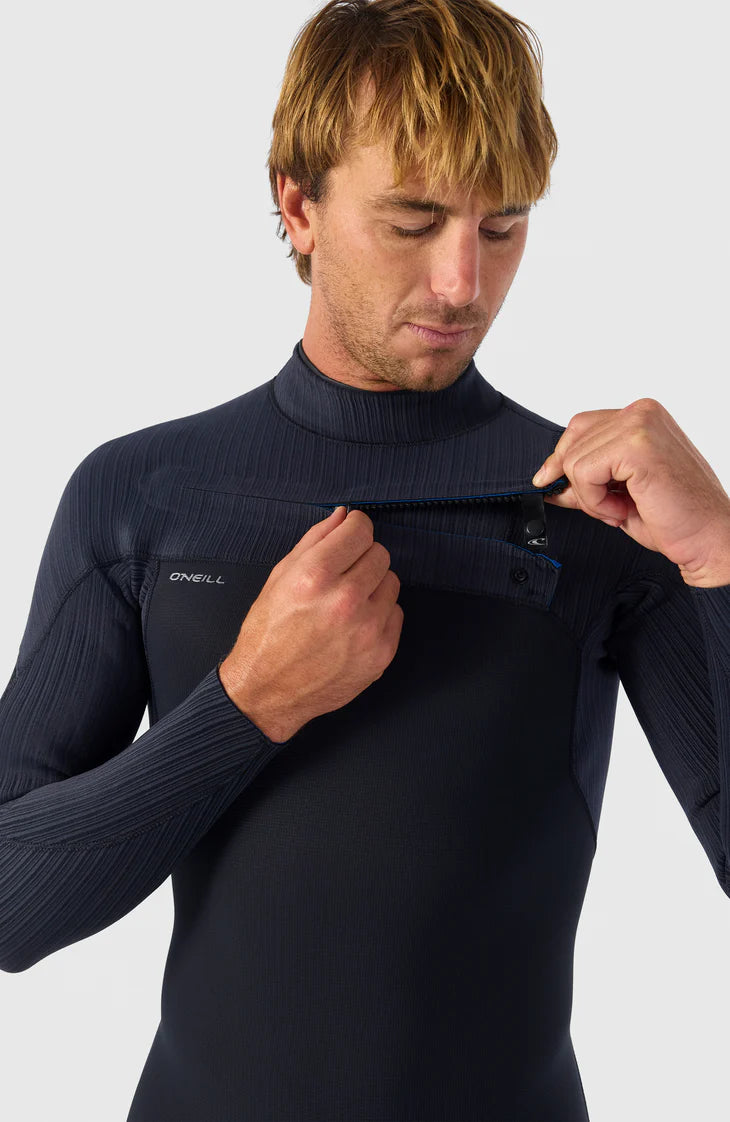 Man wearing a navy blue wetsuit with a visible Oneill logo