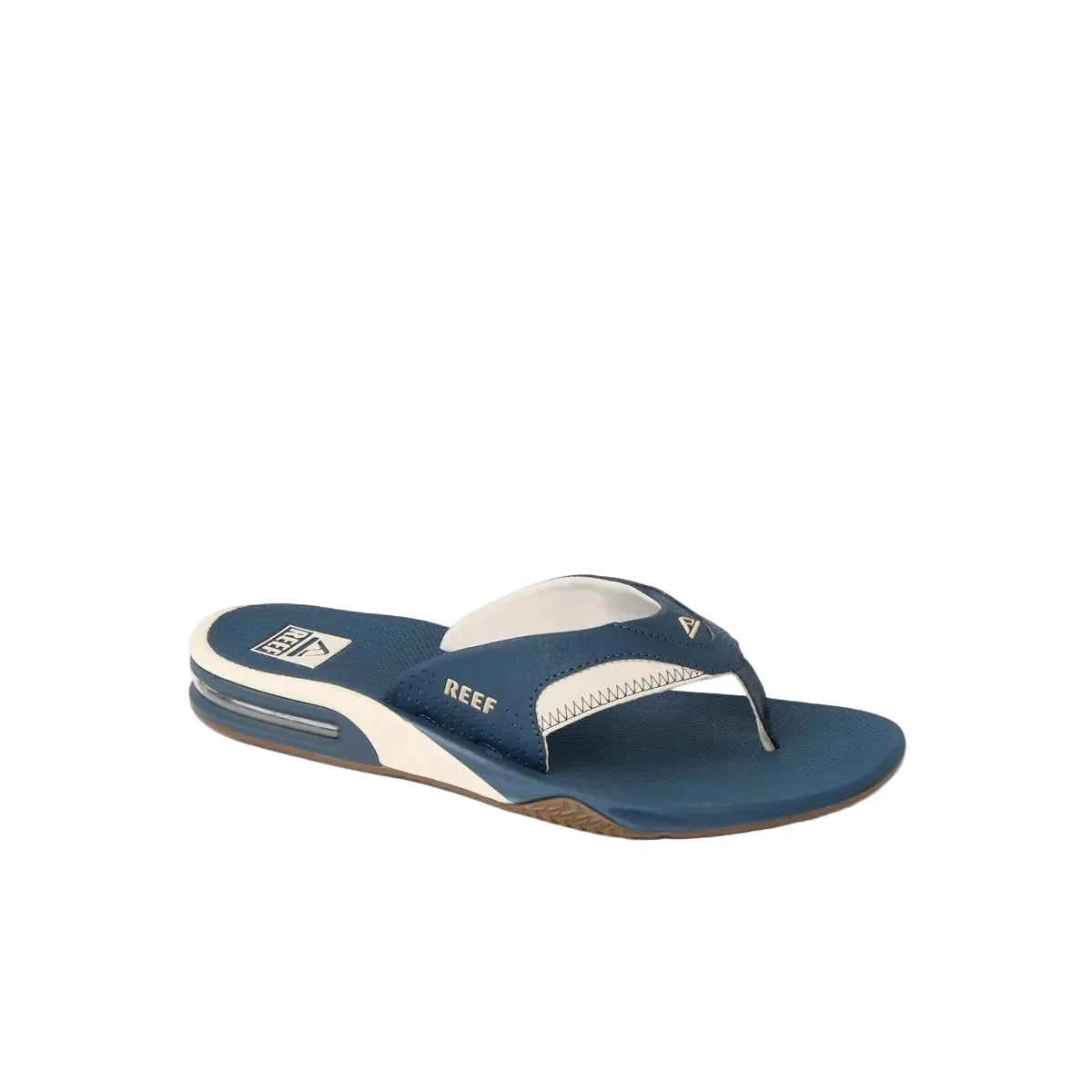 Blue and white sandal with 'Reef' branding on a white background