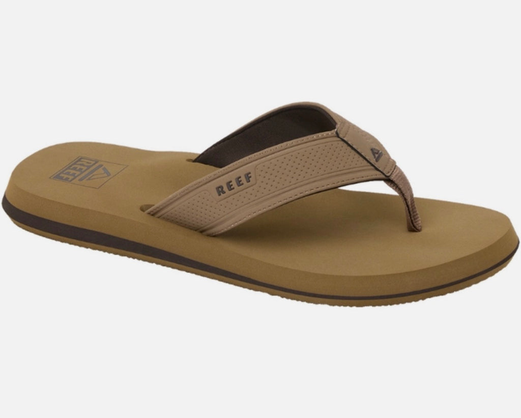 Brown sandal with black sole on a white background