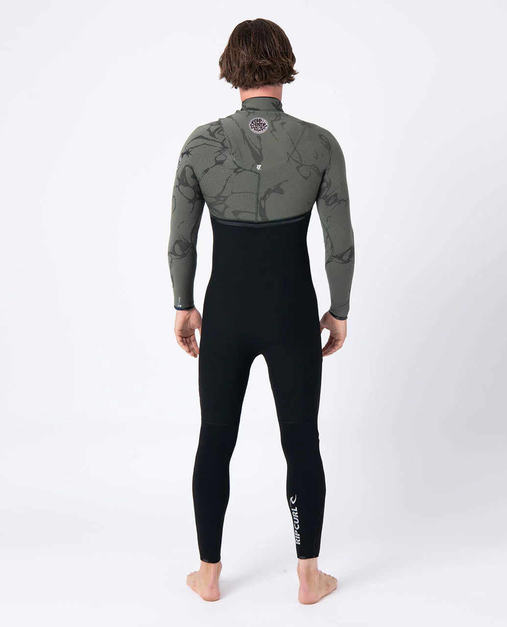 Person wearing a black and gray wetsuit on a white background