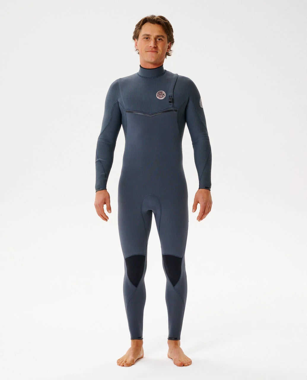 Person wearing a gray Ripcurl zipperless wetsuit on a white background