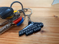 Adventure Bay Surf Shop branded key ring attached to keys