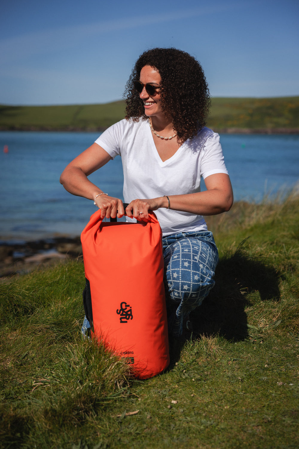 C-Skins Session 40L dry bag backpack in Flame Orange detail