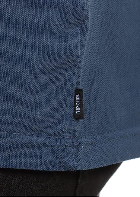 Ripcurl Premium Surf Wettie Polo in light navy, tag detail