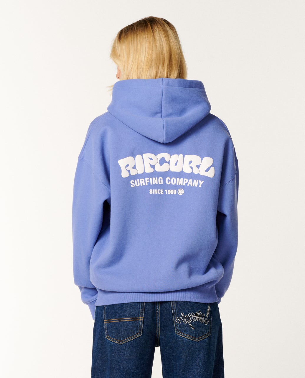 Ripcurl Surf Puff Heritage Hoodie in mid blue, back modelled view