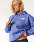 Ripcurl Surf Puff Heritage Hoodie in mid blue, front modelled view