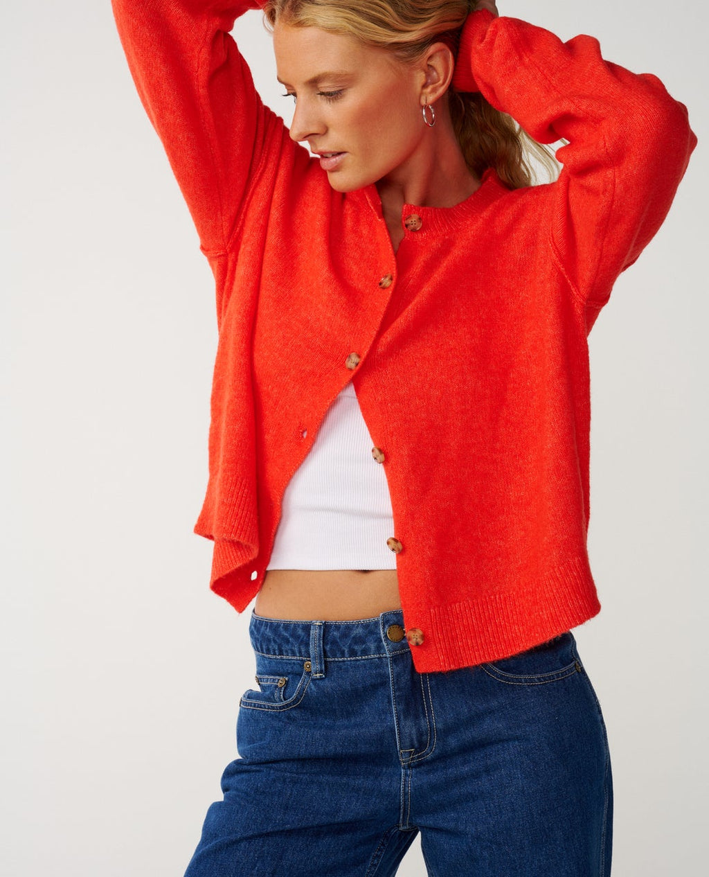 Ripcurl Women’s Emily Cardigan in red, modelled view