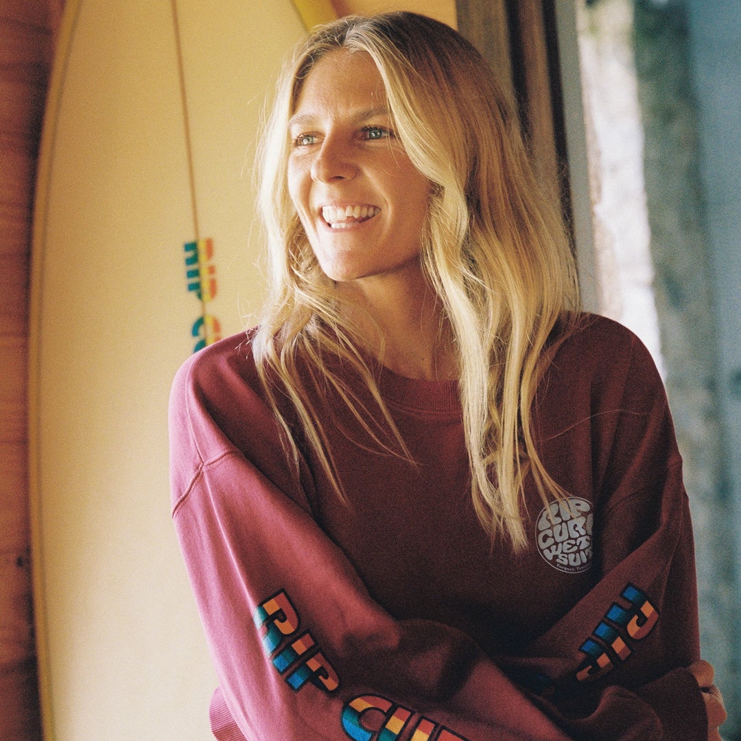 Ripcurl Women’s Stephanie Gilmore Heritage Oversized Fleece in Plum, Stephanie Gilmore wearing the sweatshirt