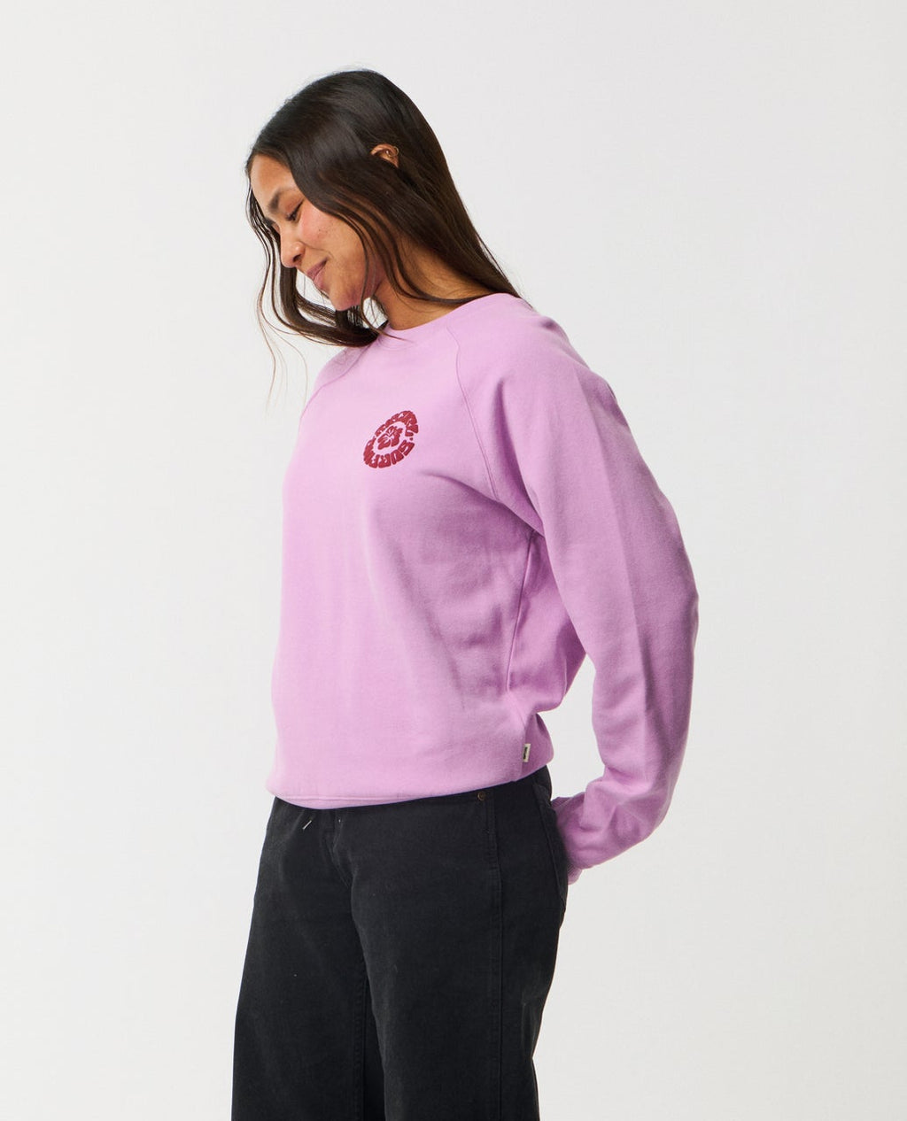 Ripcurl Women’s Surf Puff Raglan Relaxed Crew in bright lilac, side view