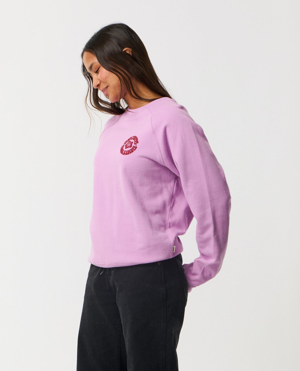Ripcurl Women’s Surf Puff Raglan Relaxed Crew in bright lilac, side view