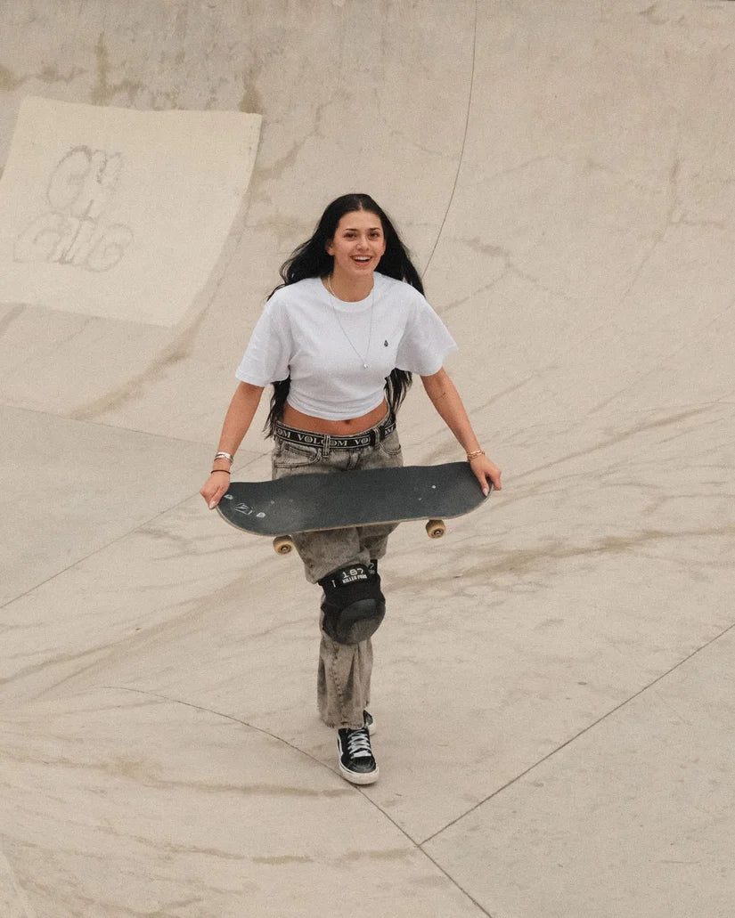 Volcom Women’s Stone Blanks Up Tee in white, skateboard model view